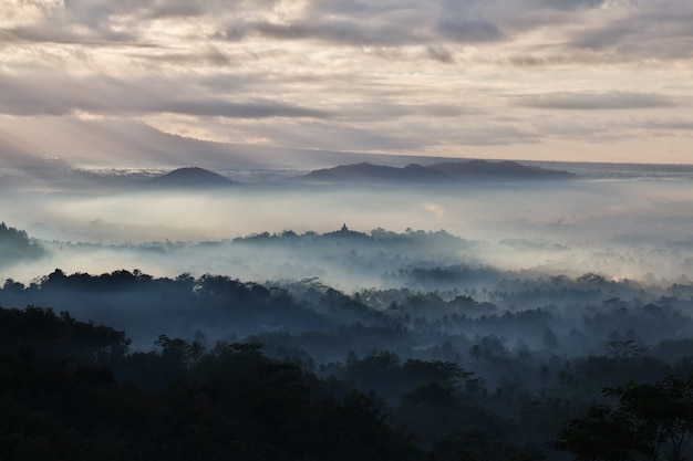 The blue fog during sunrise on Borobudur temple, Indonesia