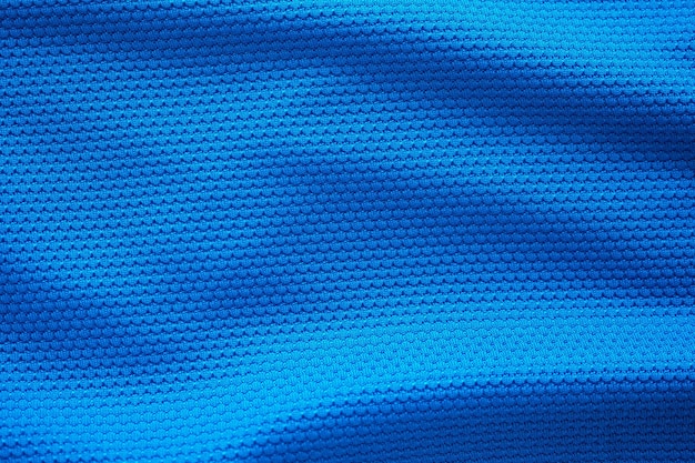 Blue football jersey clothing fabric texture sports wear background close up top view