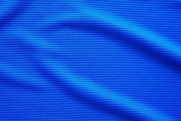 Blue football jersey clothing fabric texture sports wear background close up top view