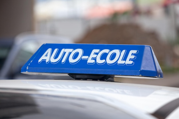 Blue French driving school sign