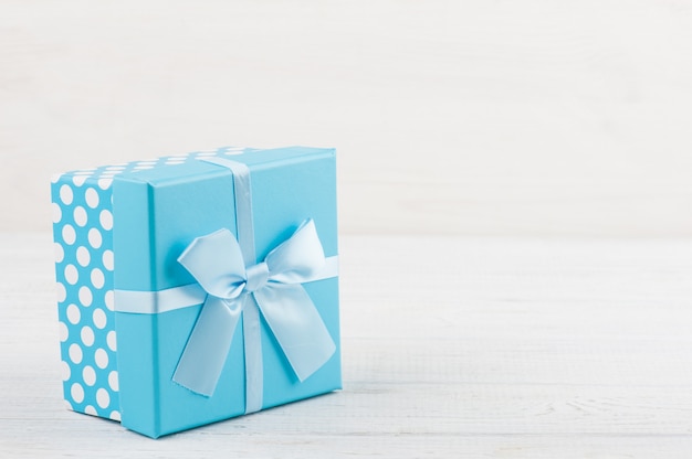 Blue gift box with bow