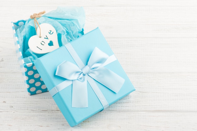 Blue gift box with heart