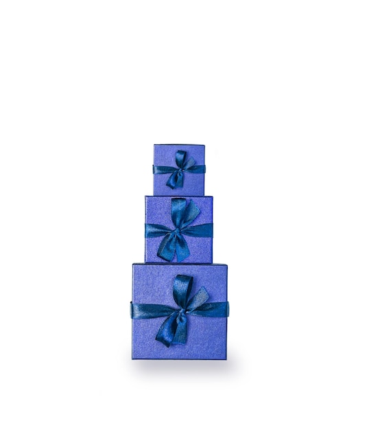 blue gift boxes stand in a stack on a white background