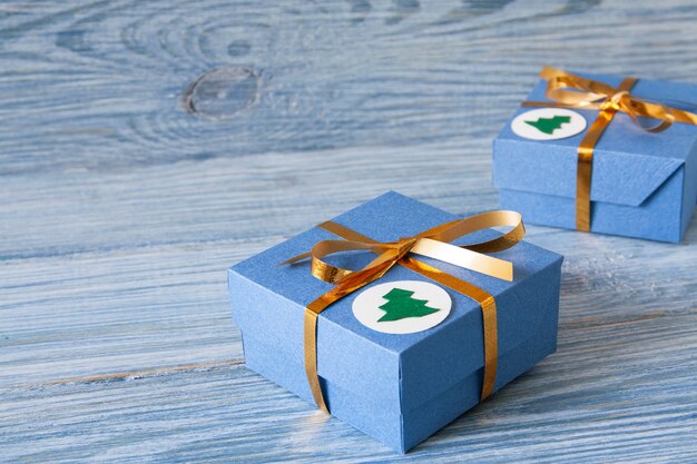 Blue gift boxes with golden ribbons for Christmas