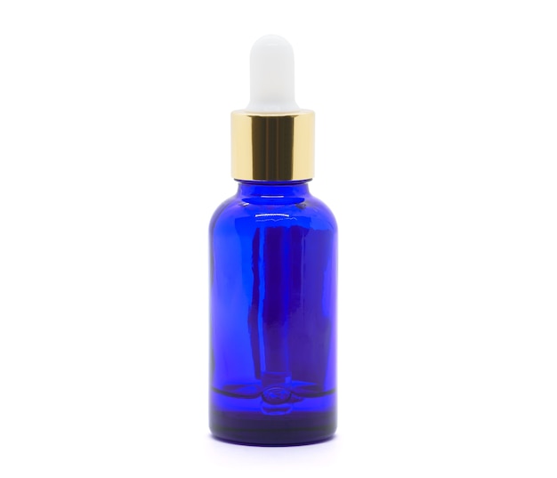 Blue glass dropper serum bottle on white background