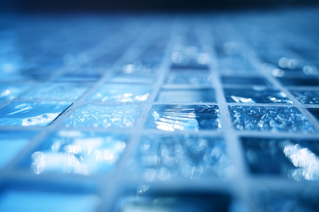 Blue glass tiles bokeh texture background