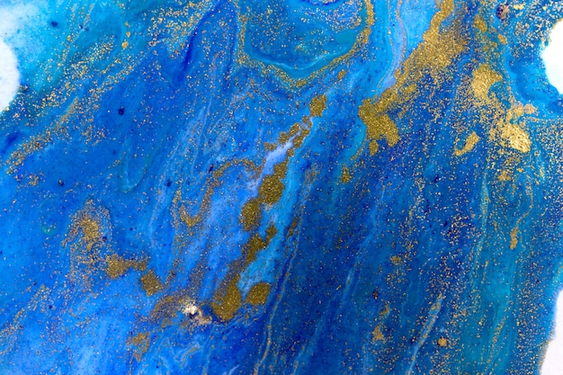 Blue and gold sequins abstract background. Turquoise color artwork texture