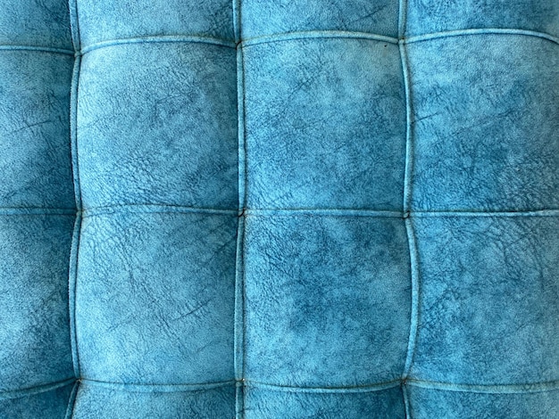 Blue gold velvet surface of the cushion for background fabric with grained texture furniture wrapping pouf