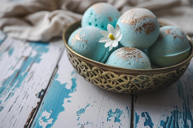 Blue golden bath bombs on weathered white table spa arrangement