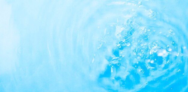 Photo blue gradient water background summer blue wave abstract or natural wavy water texture background defocus the perfect backdrop for a presentation