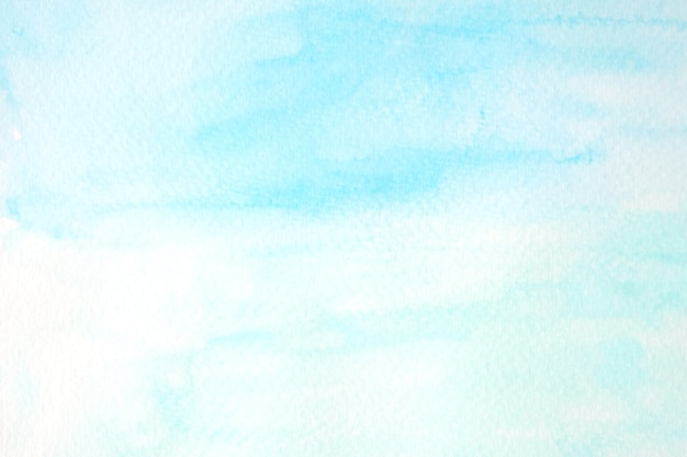 Blue and green abstract watercolor painting textured on white paper background