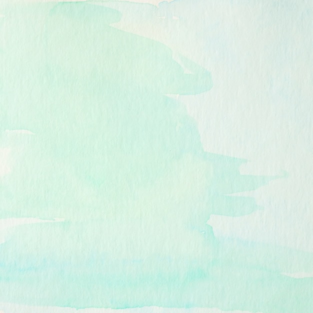 Blue and green abstract watercolor painting textured on white paper background