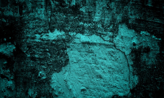 A blue and green image of a wall with a white sign that says'blue '