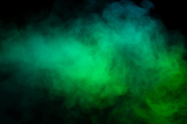 Premium Photo Blue and green steam on a black background