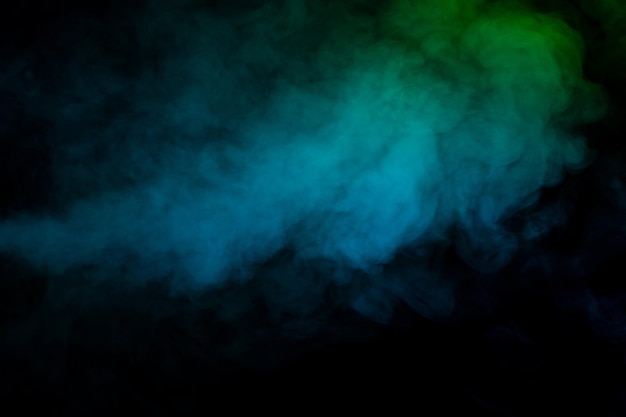 Blue and green steam on a black background