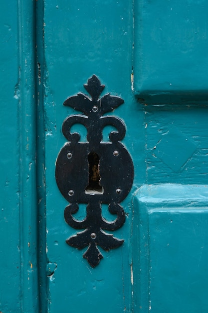 Blue handle door rusty iron handle