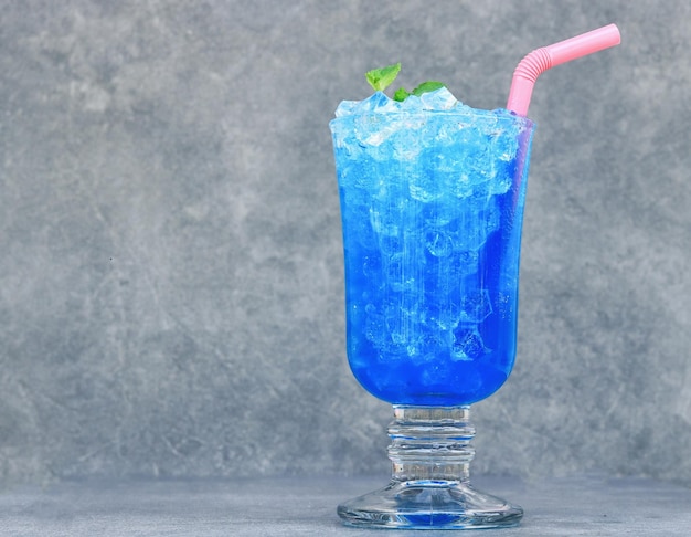 Blue Hawaii summer cocktail and mint leaves