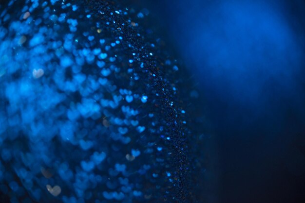 Blue heart bokeh with sparkle glittering background