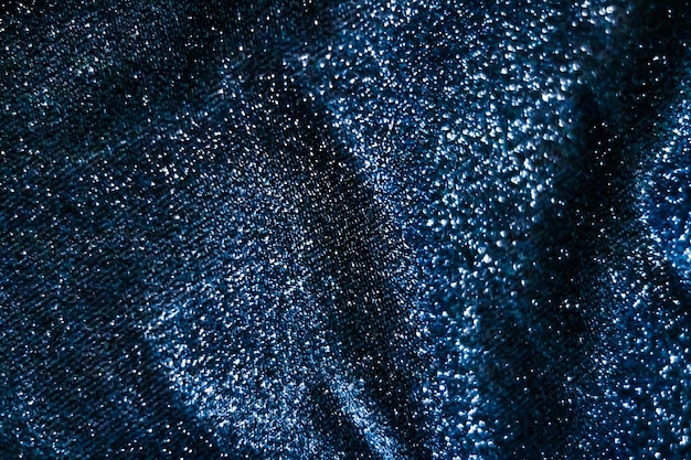 Blue holiday sparkling glitter abstract background luxury shiny fabric material for glamour design and festive invitation