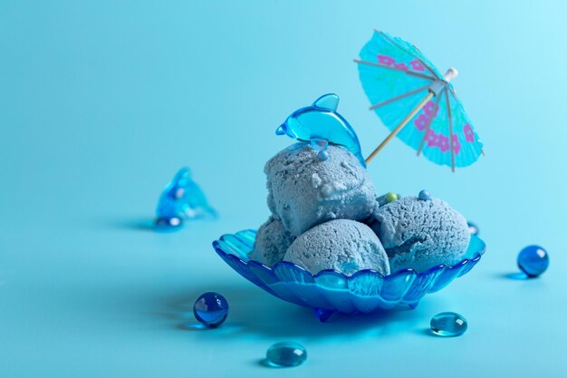 Blue ice cream in a glass plate