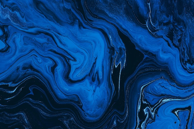 Blue ink liquid abstract marble texture background