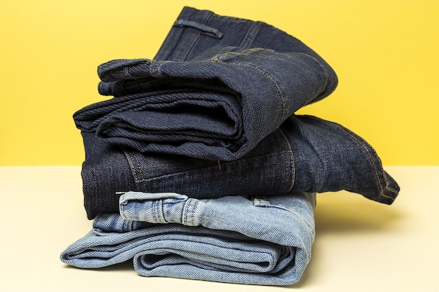 Blue jeans on colorful background isolated. Denim fashion details