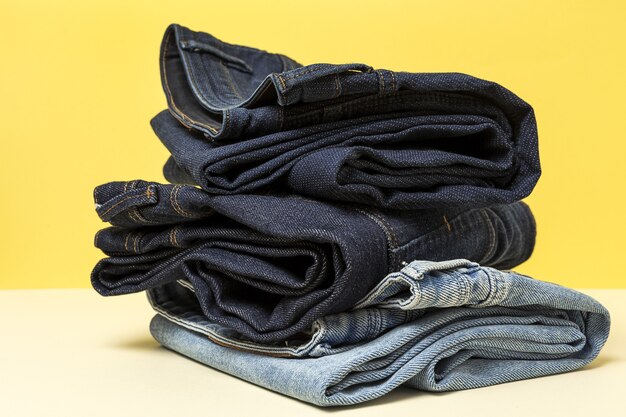 Blue jeans on colorful background isolated. Denim fashion details