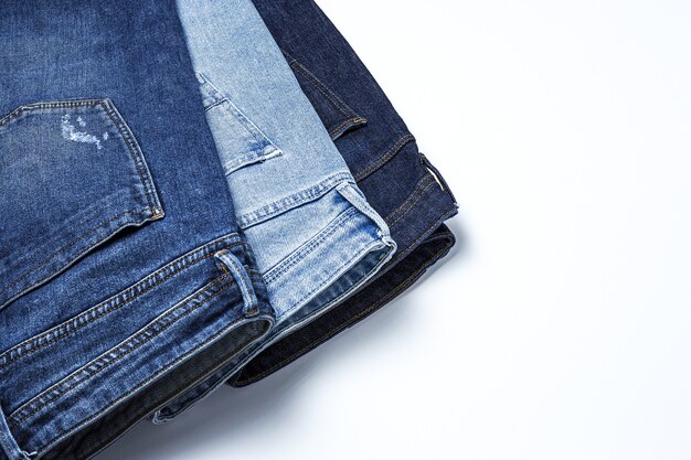 Blue jeans on colorful background isolated. Denim fashion details