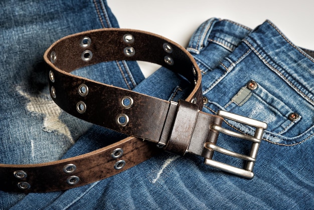 Premium Photo | Blue jeans with belt