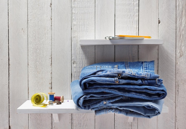 Blue jeans on wooden shelf