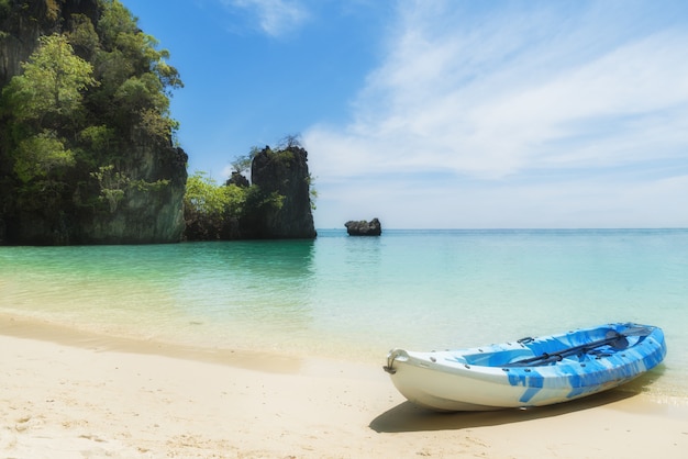 Blue kayaks on the tropical beach in Phuket, Thailand. Summer, Vacation and Travel concept.