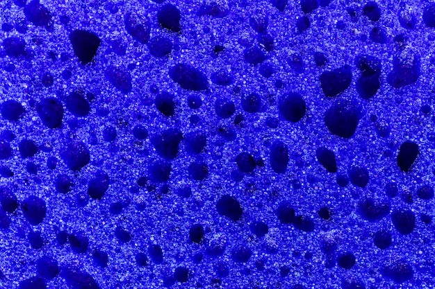 Blue kitchen sponge texture pattern detailed background\
close-up