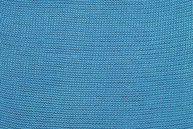 Blue knitted fabric texture background