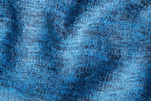 Blue knitted fabric texture.