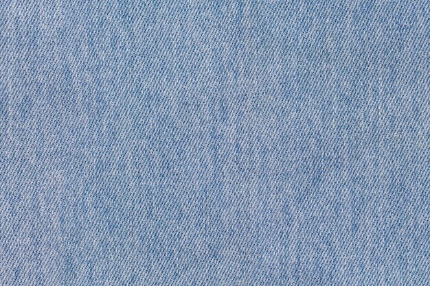 blue light denim background and texture blue jeans material background