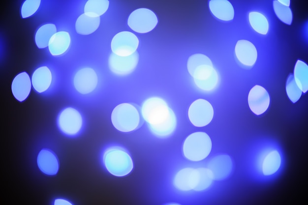 Blue lights defocused night bokeh background.