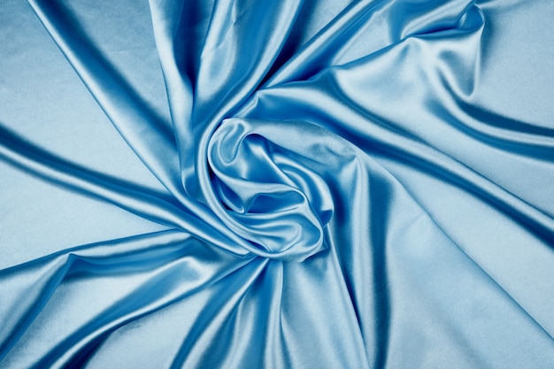 Blue luxury satin fabric texture for background