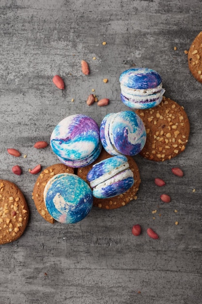 blue macaroons on a grey concrete background