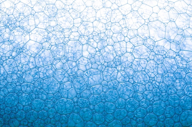 Blue macro soap bubbleswater abstract macro foam\
backgroundmacro close up of soap bubbles