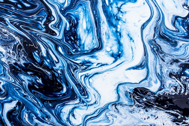 Blue marble cosmic liquid ink texture