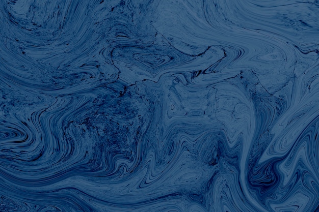 Blue marbled acrylic paint background