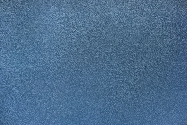 Photo blue material of leather texture surface close up use for background.