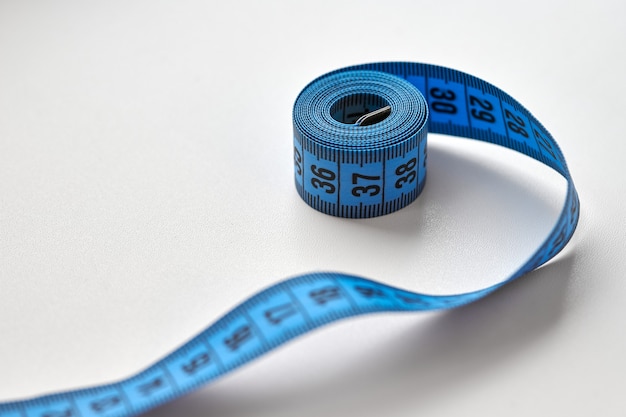 Blue measuring tape of tailor isolated