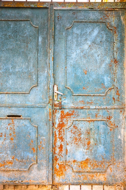 Blue metal doors Old vintage style Rusty texture