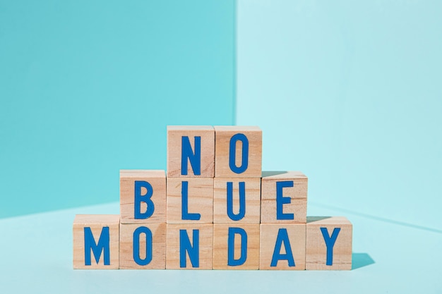 Концепция синий понедельник с кубиками