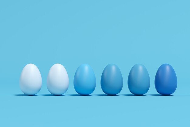 Uova monotonali blu su fondo blu. concetto di idea di pasqua minimale.