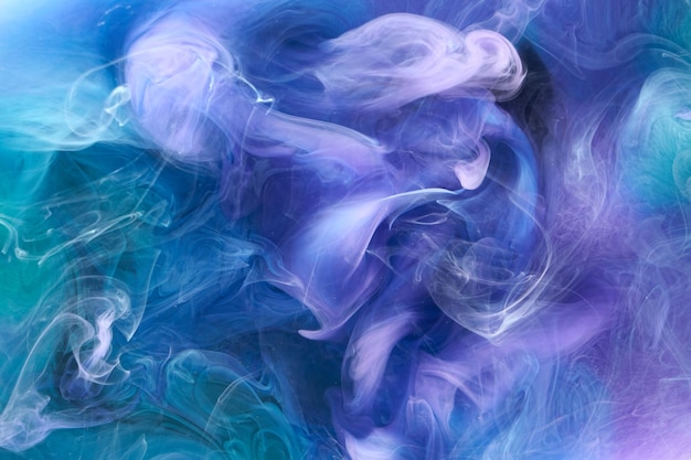 Blue multicolored smoke abstract background acrylic paint underwater explosion