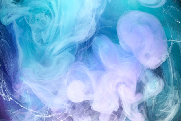 Blue multicolored smoke abstract background acrylic paint underwater explosion