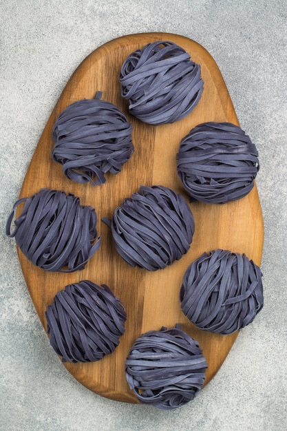 blue noodles with anchana flowers