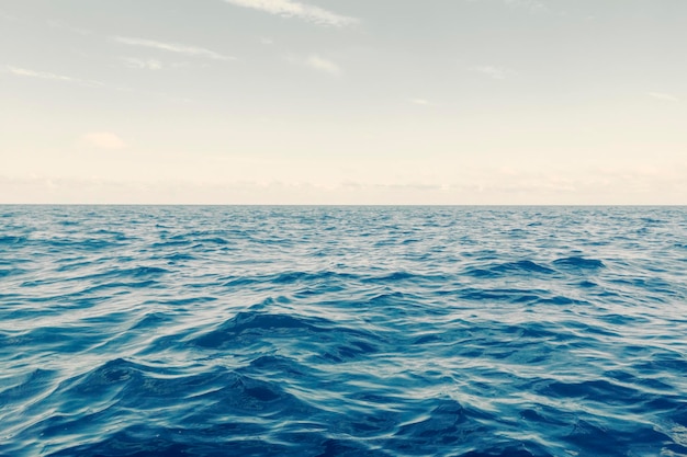 Blue Ocean, Water Surface and Blue Sky